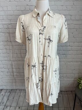 Light Cream Button-Front Tiered Dress with Black Bow Print